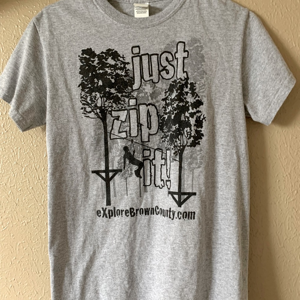 Just zip it brown county tee shirt